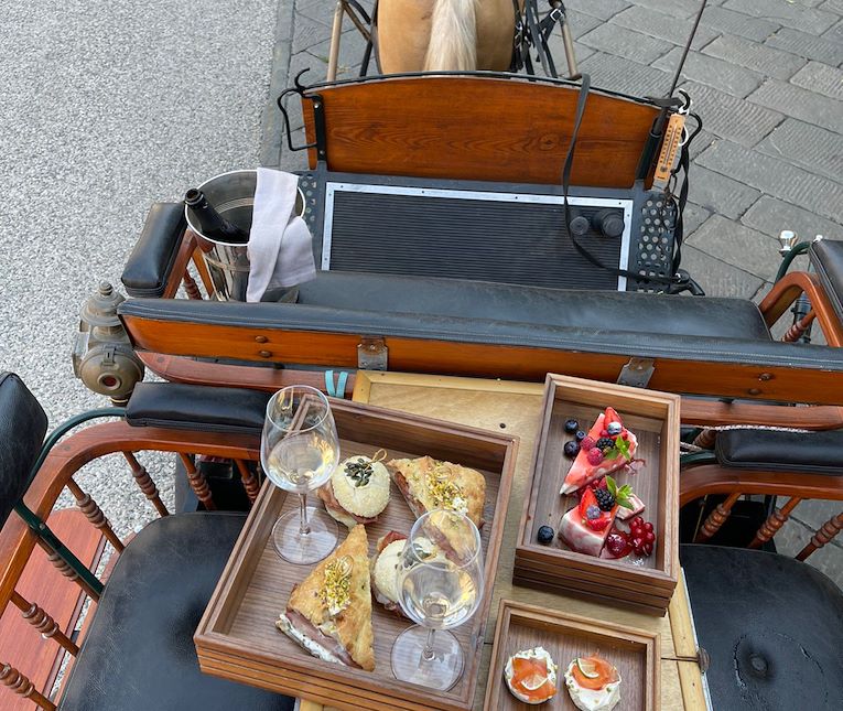 "Lucca by horse carriage with Aperitif or with a typical local snack " 